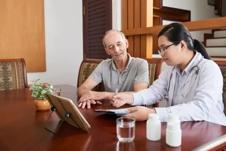 Bilingual doctor speaking with a patient